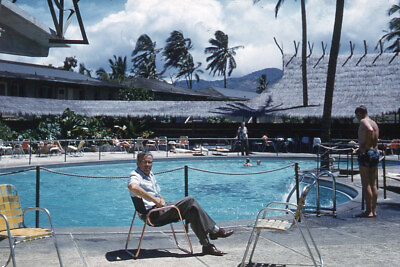 #ad 1950s Red Border Kodachrome Slide Man Sitting Beside Resort Swimming Pool