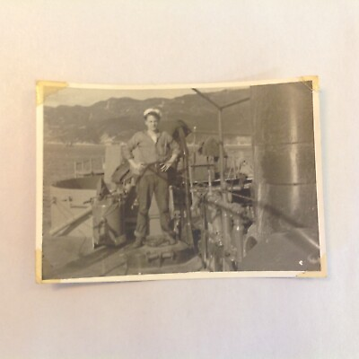 #ad Vtg WWII Era Bamp;W Photograph Jaunty Sailor Poses Above Decks Mountain Range Bkgd